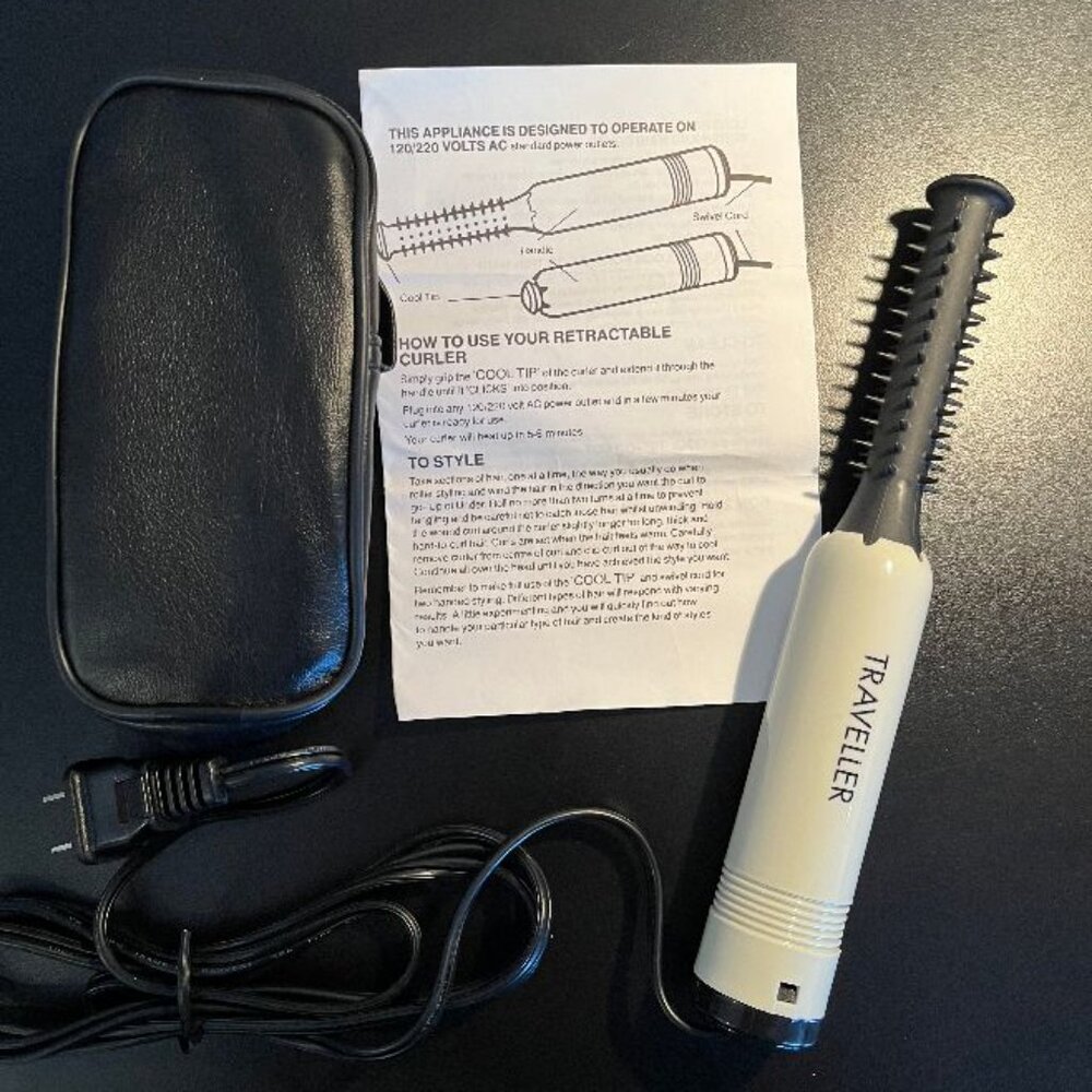 Traveller Retractable Curler with Original Travel Case & Instructions.